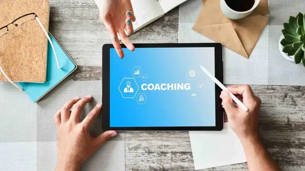 Une tablette avec écrit coaching sur l'écran